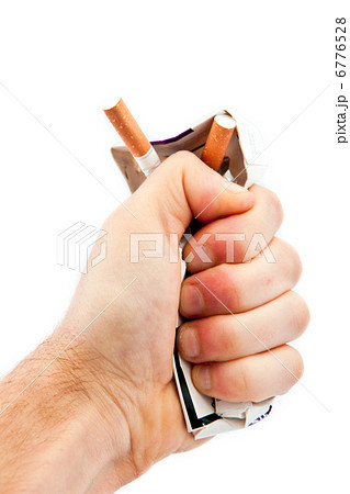 Hand crushing a cigarette pack 6776528