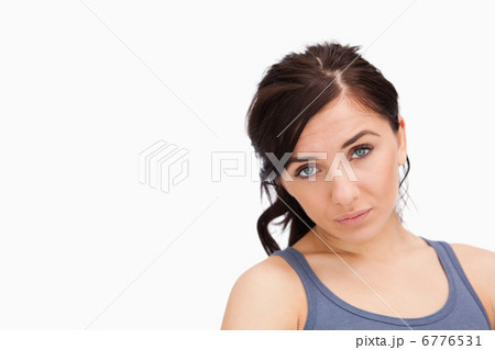 Unhappy young woman looking at camera 6776531