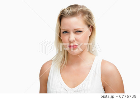 Serious attractive woman looking at the camera Serious attractive woman looking at the camera 6776739
