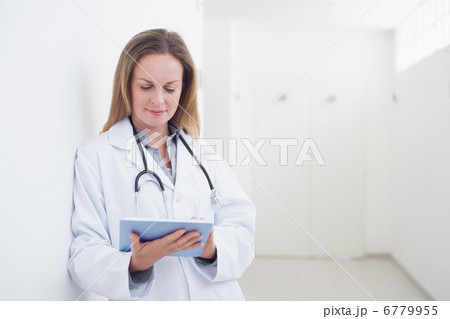 Doctor using an ebook 6779955
