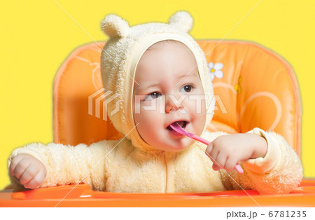 Baby boy eating oatmeal Baby boy eating oatmeal 6781235