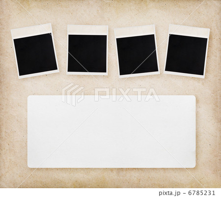 Empty instant photos on old paper texture Empty instant photos on old paper texture 6785231