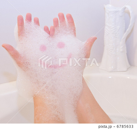 Smile on soap foam on hands Smile on soap foam on hands 6785633