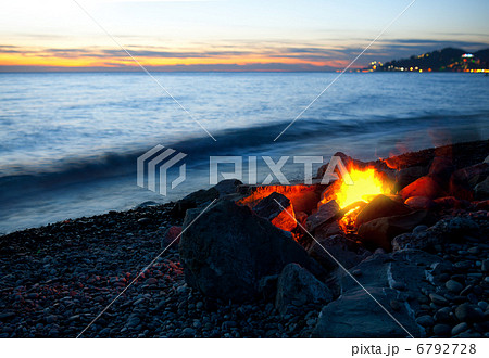 Bonfire on the beach, sunset 6792728