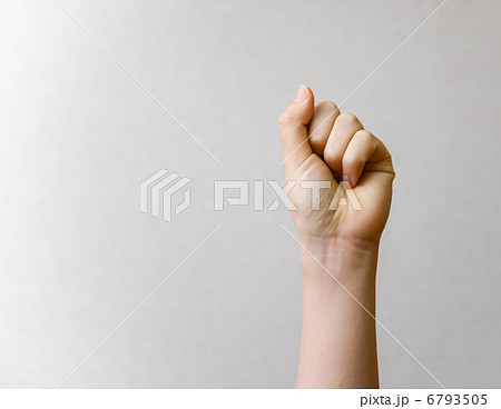 女性の握りこぶしの写真素材