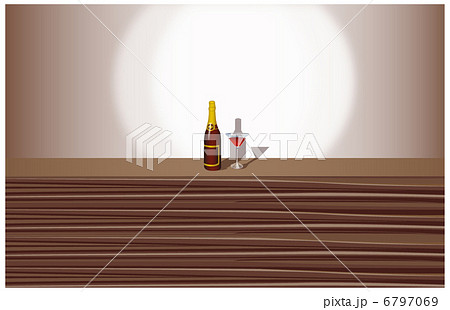 Wineglass and bottle on counter 6797069