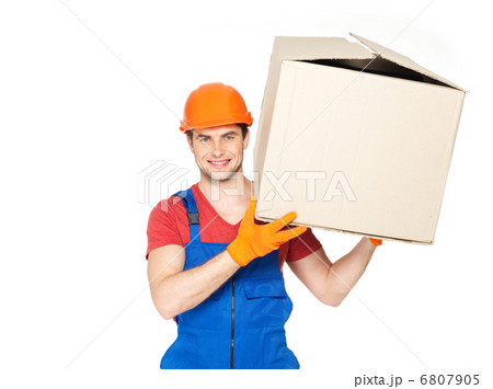 handsome young delivery man with paper boxes 6807905