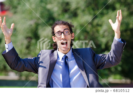 Young businessman at the street scene 6810512