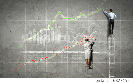 businesspeople drawing diagrams on wall businesspeople drawing diagrams on wall 6827152