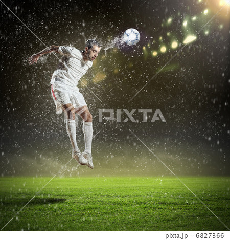 football player striking the ball football player striking the ball 6827366