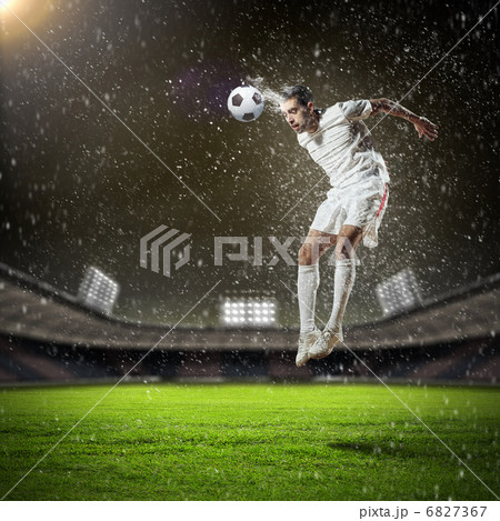 football player striking the ball football player striking the ball 6827367