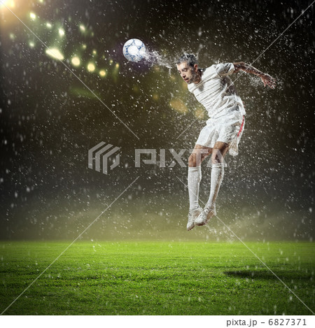 football player striking the ball 6827371