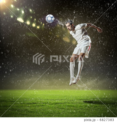 football player striking the ball 6827383