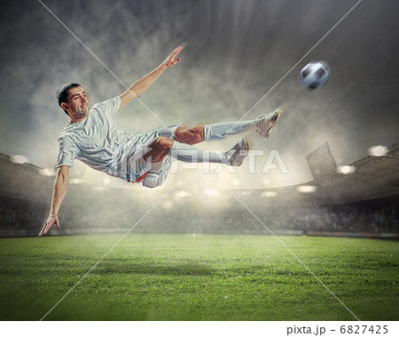 football player striking the ball football player striking the ball 6827425