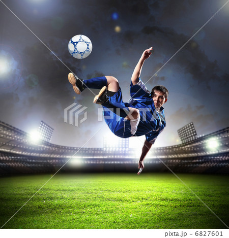 football player striking the ball football player striking the ball 6827601