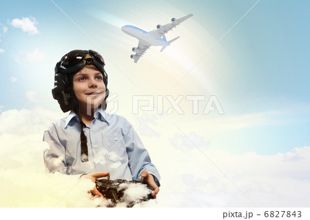 Little boy in pilots hat 6827843