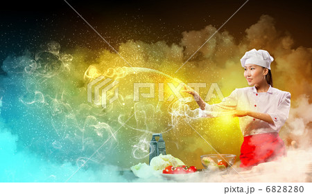 Asian female cooking with magic 6828280
