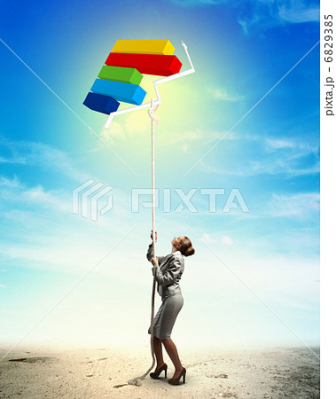 Image of businesswoman climbing the rope 6829385