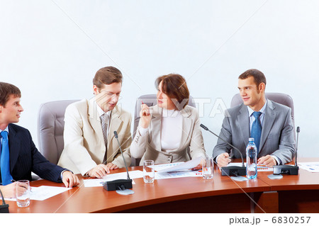 Four businesspeople at meeting Four businesspeople at meeting 6830257