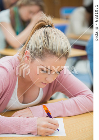 Woman taking notes Woman taking notes 6831051