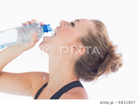 Woman drinking after workout Woman drinking after workout 6831807