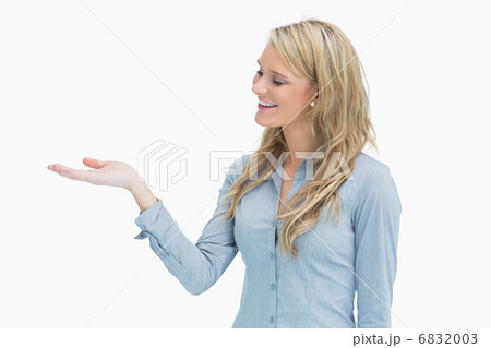 Woman looking at her hand 6832003