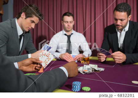 Men at the poker table Men at the poker table 6832201