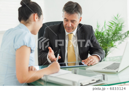 Business people explaining something at work Business people explaining something at work 6833124