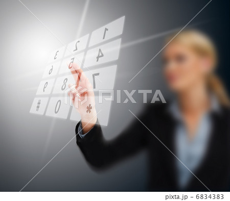 Businesswoman entering code on number pad hologram 6834383