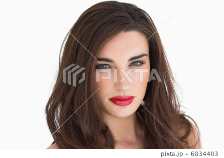 Woman with red lips staring at camera 6834403