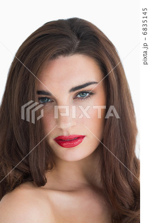 Woman with wavy hair and red lips 6835145