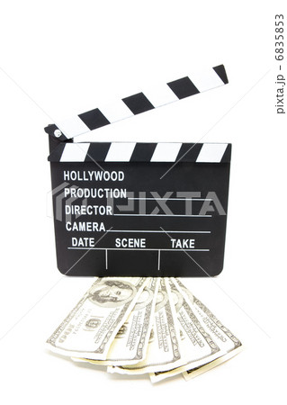 Fanned out dollars under film slate 6835853