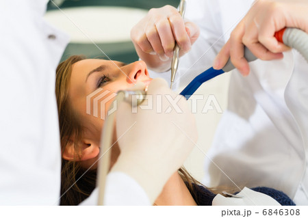 Patient with Dentist - dental treatment 6846308