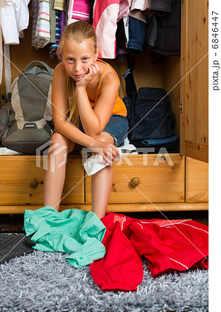 Family - child in front of her closet or wardrobe 6846447