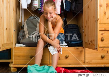 Family - child in front of her closet or wardrobe 6846450