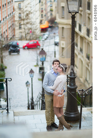 Romantic loving couple kissing on Montmartre 6848966