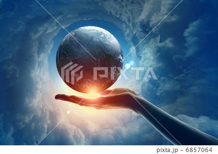 Image of earth planet on hand 6857064