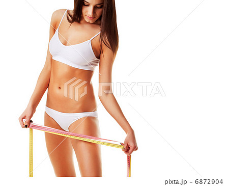 Woman looking at measure Woman looking at measure 6872904