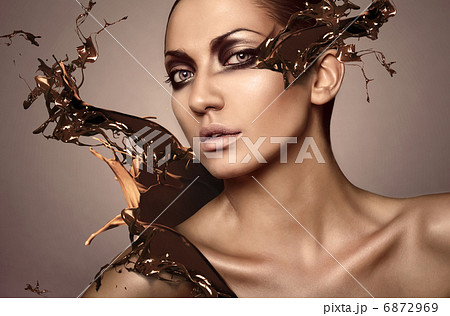 portrait of woman with chocolate splash 6872969