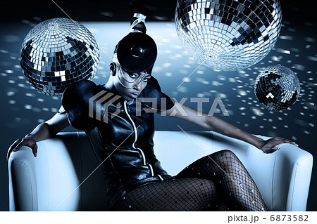 Attractive african woman with disco balls Attractive african woman with disco balls 6873582