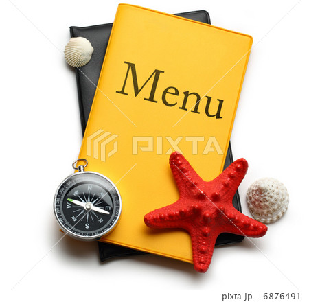 Yellow menu book, seastar and seashells 6876491
