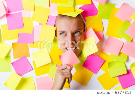 Woman with lots of reminder notes Woman with lots of reminder notes 6877812