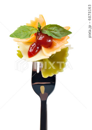 Pasta farfalle with sauce on a fork 6878163