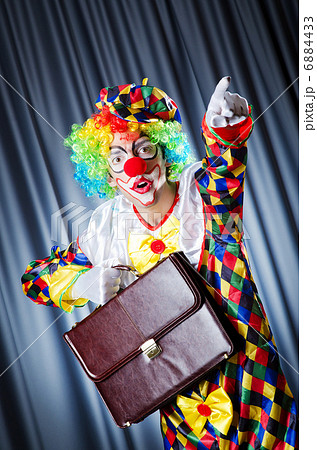 Clown with business briefcase 6884433