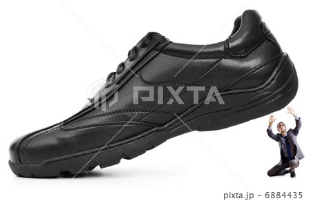 Woman domination concept with shoes and man 6884435