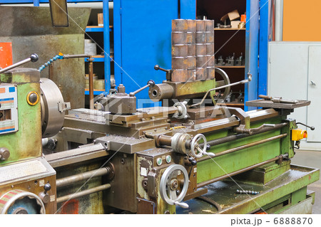 Old lathe in workshop of the plant 6888870