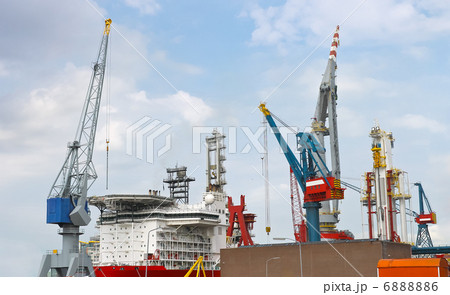 Industrial landscape. Ship and crane in shipyard Industrial landscape. Ship and crane in shipyard 6888886