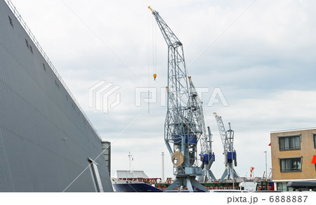 Covered dock and cranes in shipyard Covered dock and cranes in shipyard 6888887