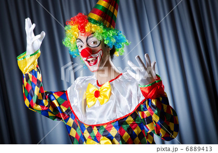 Funny clown in studio shooting 6889413