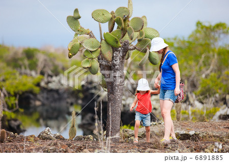 Mother and daughter walking at scenic terrain Mother and daughter walking at scenic terrain 6891885